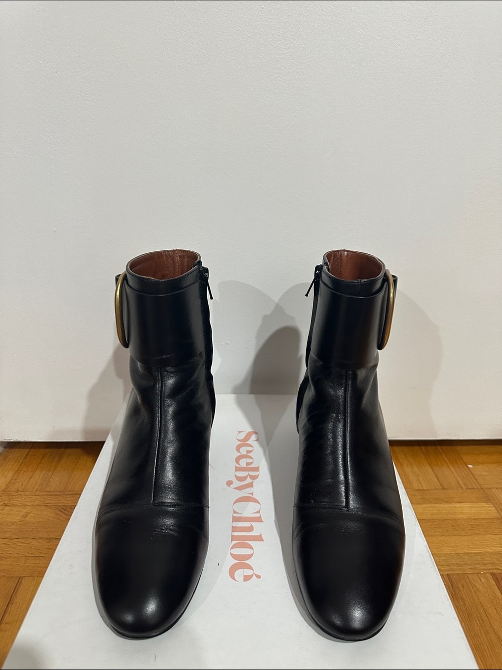 See By Chloe Black Leather Ankle Boots with Brass Ring Detail